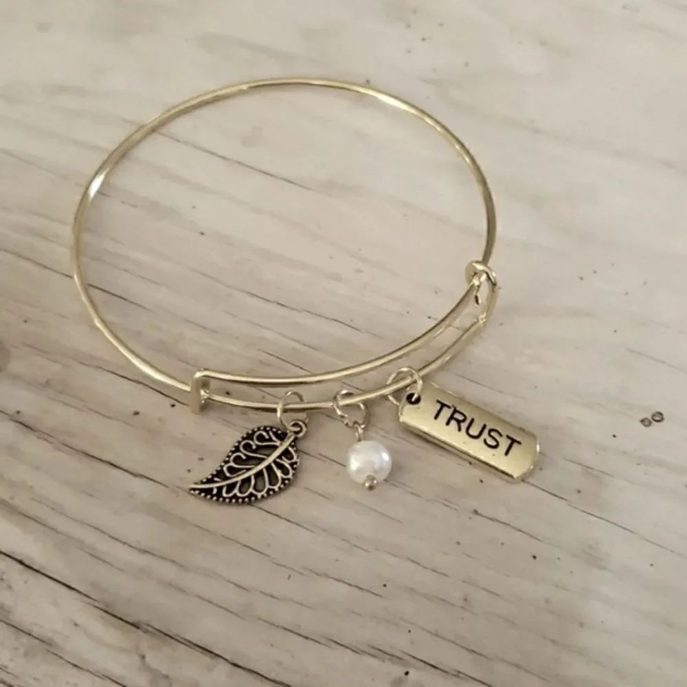 Bracelets by Sandra gold tone adjustable, trust
